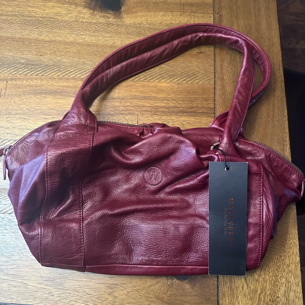 Wanderers Travel Co new with tag burgundy leather purse